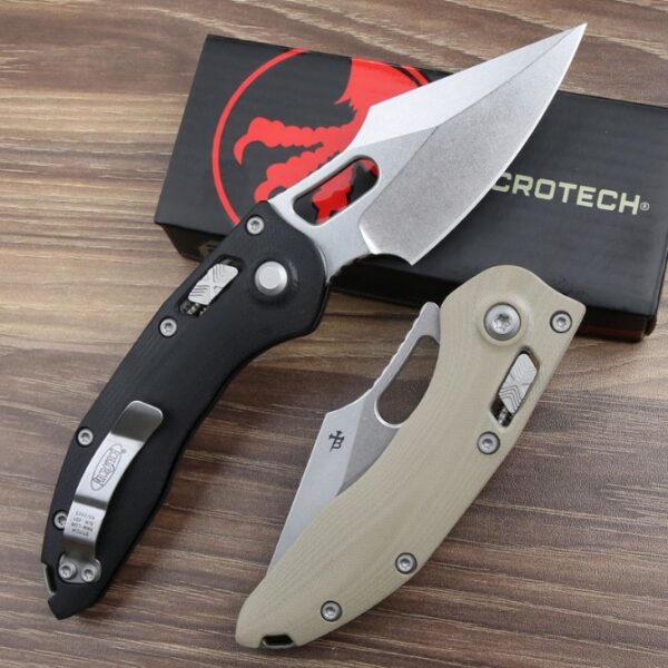 Back view of the Microtech Stitch RAM-LOK folding knife featuring a G10 handle