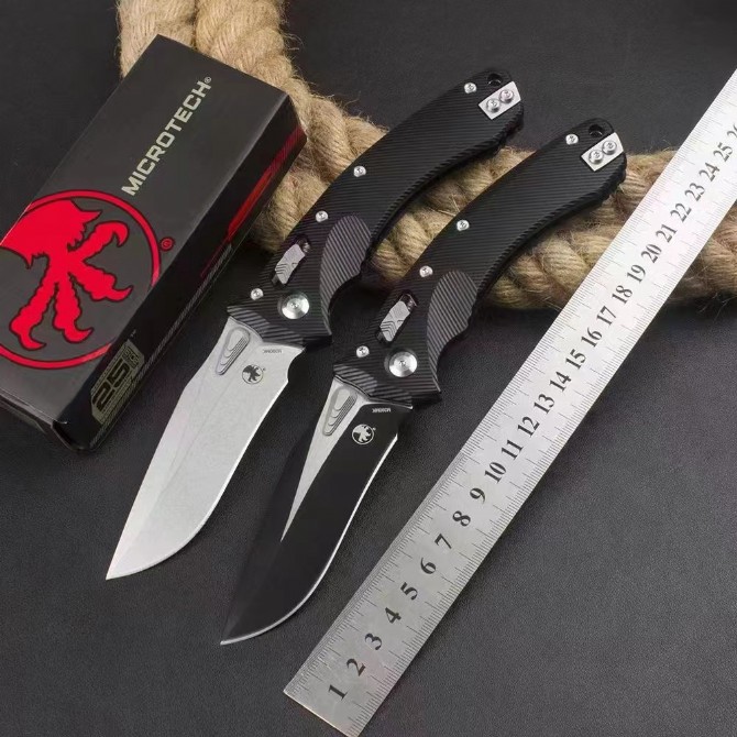 Microtech Amphibian Folding Knife – Aluminum Handle, full knife with packaging view