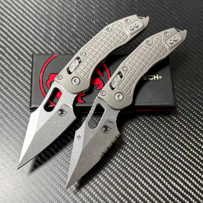 Microtech Stitch Dark Needle Folding Knife – Titanium Handle, front view