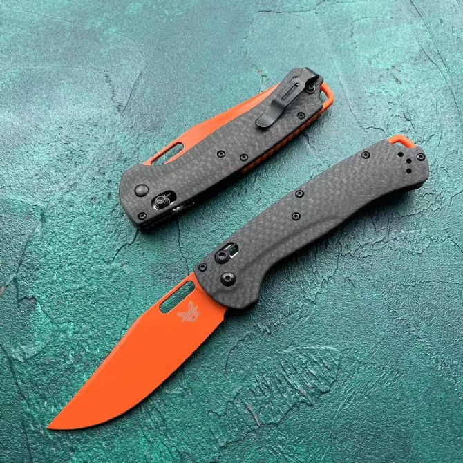 Benchmade 15535 bugout folding knife carbon fiber handle orange blade open and folded view