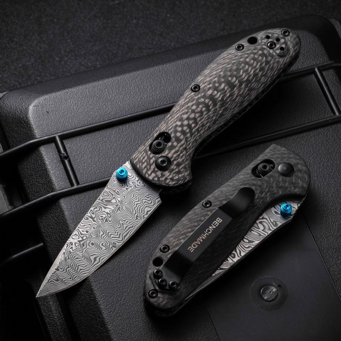 Benchmade 556 mini griptilian folding knife carbon fiber handle damascus blade open folded comparison
