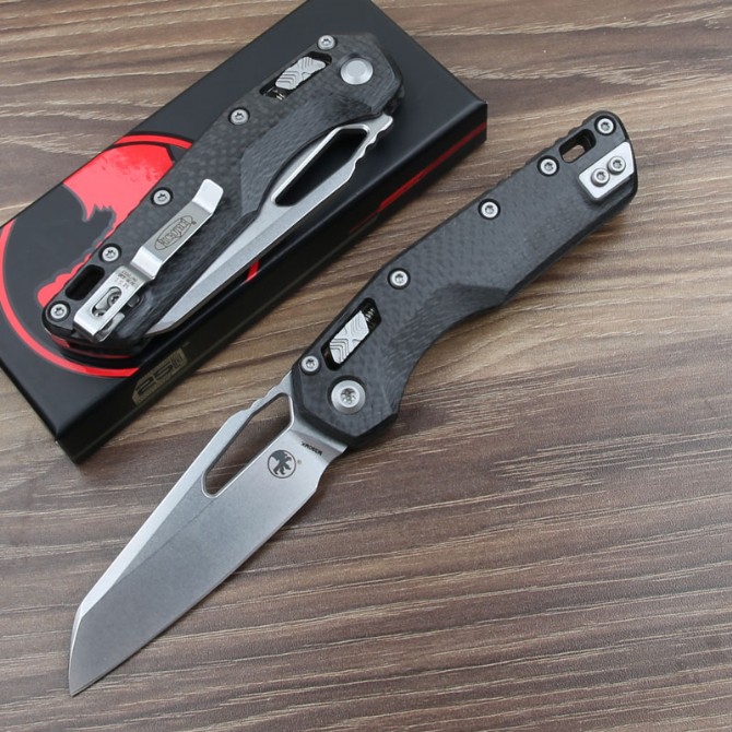 Microtech MSI folding knife with carbon fiber handle shown with original packaging