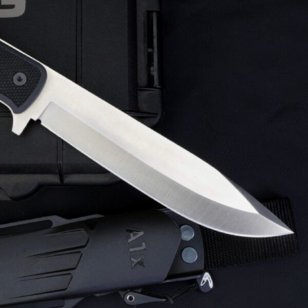 Blade close-up of Fallkniven A1x Survival Knife showing edge grind and finish