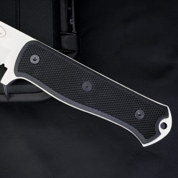 Close-up of Fallkniven A1x Survival Knife handle showing grip texture and ergonomic design