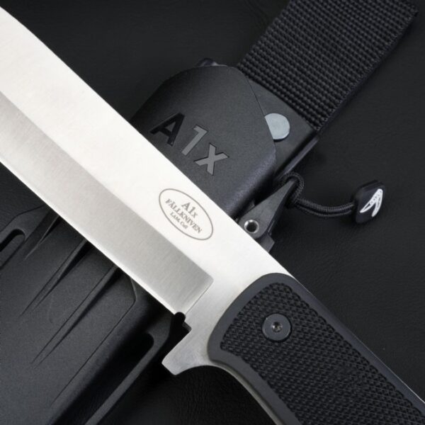 Close-up of the ricasso area where blade meets handle on Fallkniven A1x Survival Knife