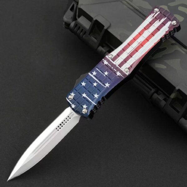 Front view of Microtech Hera OTF automatic knife with USA flag handle in deployed position