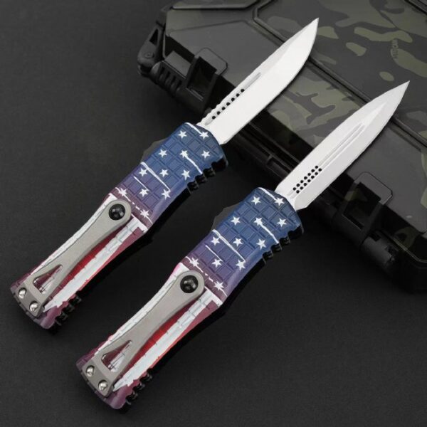 Rear view of Microtech Hera OTF automatic knife USA flag handle showing handle design and hardware.