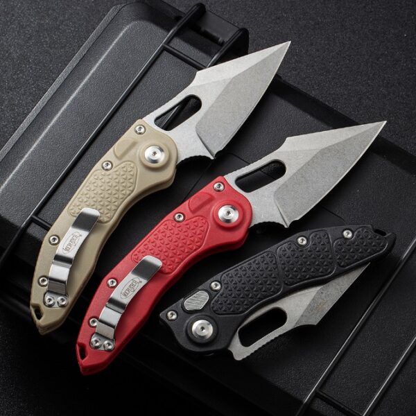 Microtech Stitch side-opening automatic knives shown with desert, red, and black handle color options