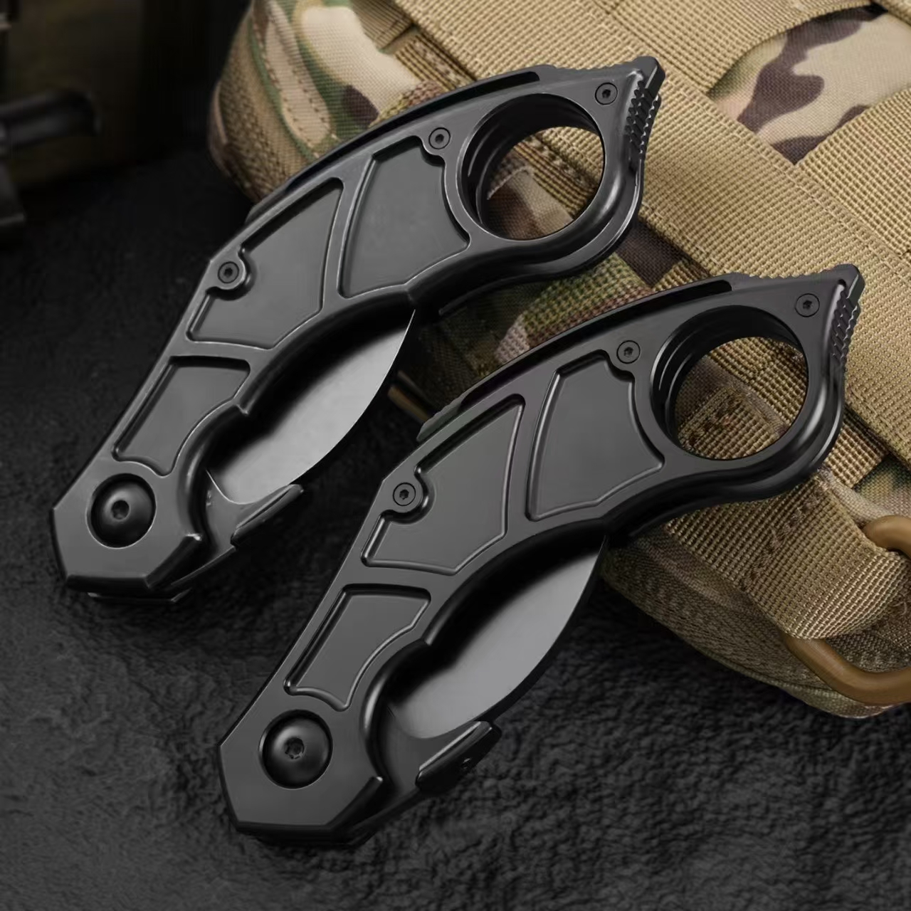 Side view of Quartermaster QSE-14 Murtaugh folding karambit knife in folded state showing blade profile