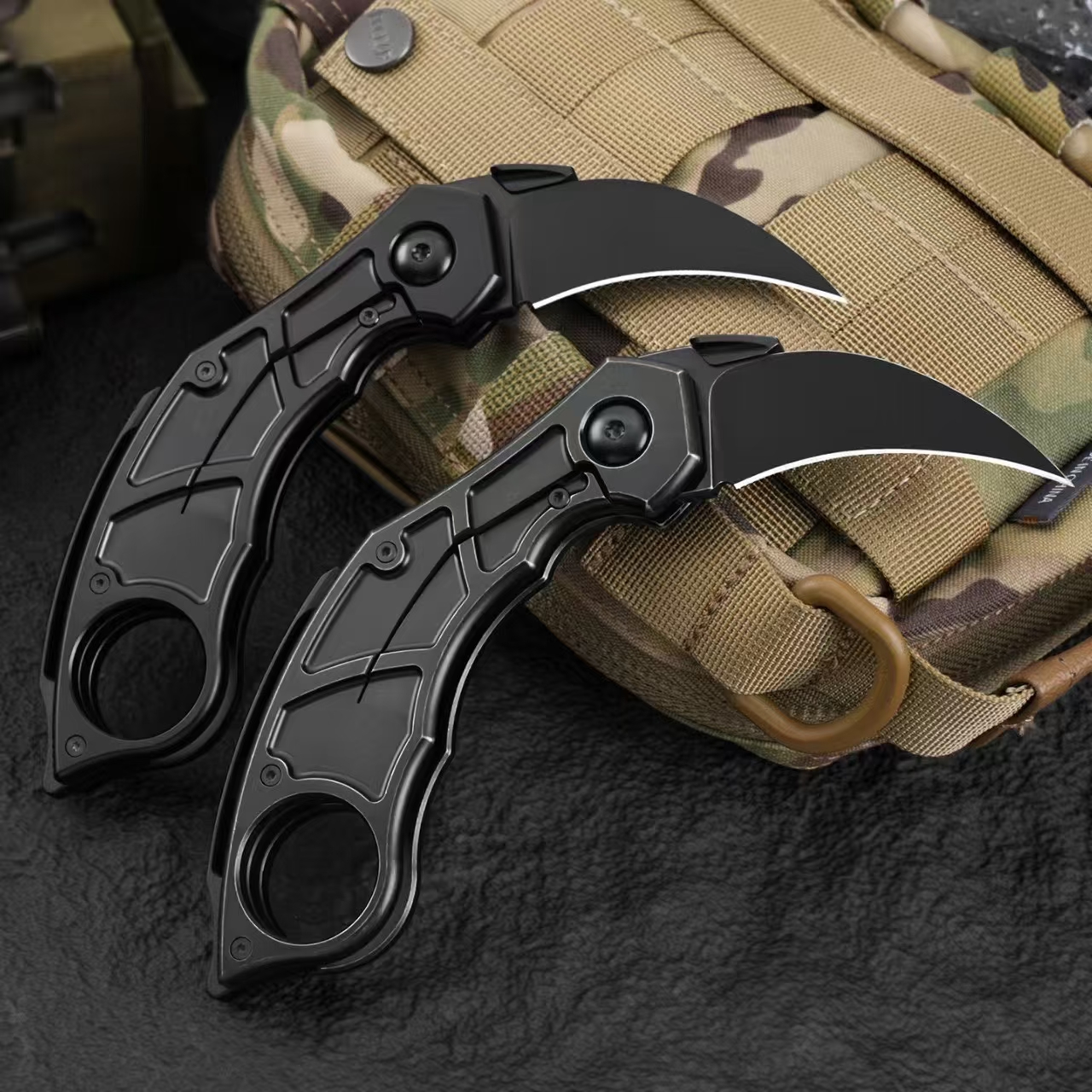 Rear view of Quartermaster QSE-14 Murtaugh folding karambit knife showing handle and clip side