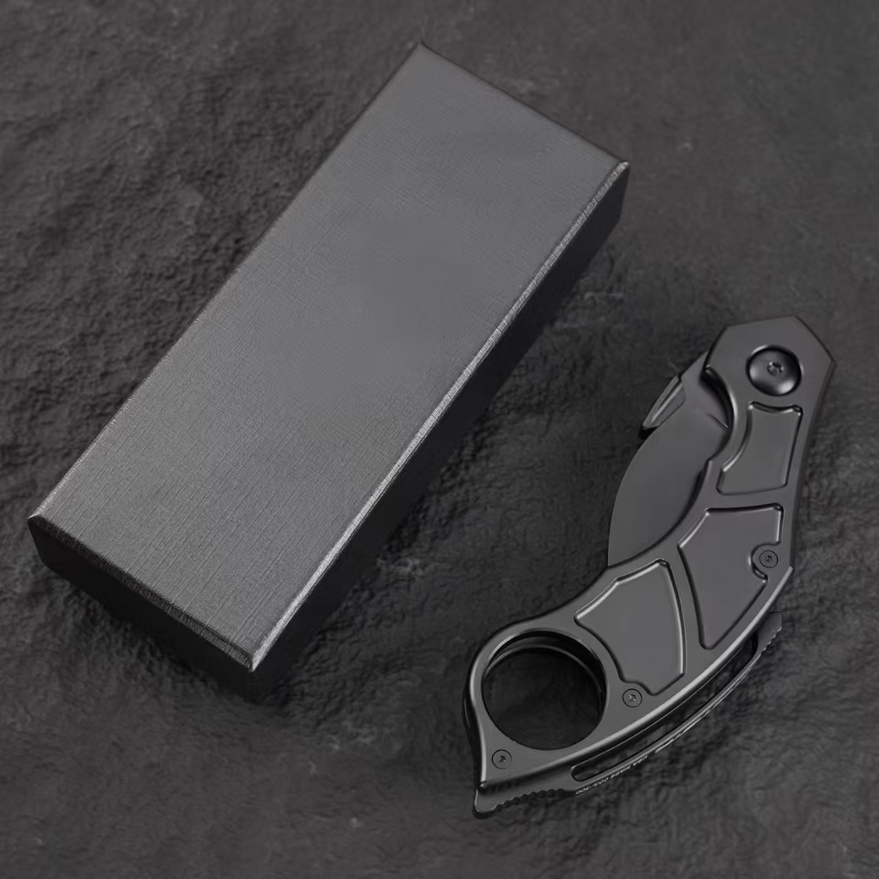 Quartermaster QSE-14 Murtaugh folding karambit knife displayed with original packaging box