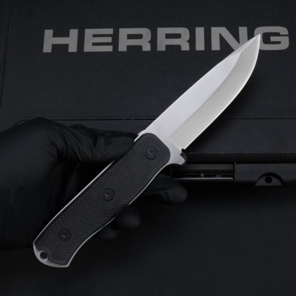 Fällkniven F1x Air Force Survival fixed blade knife shown in hand for size reference