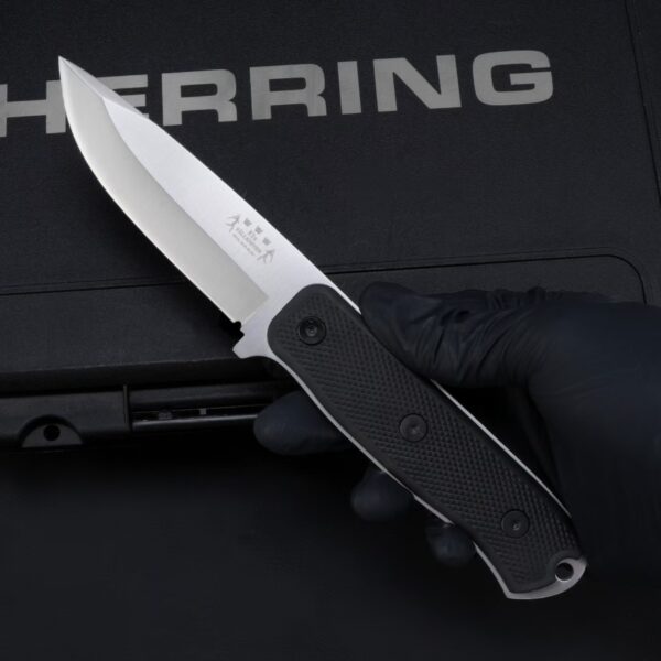 In-hand grip view of the Fällkniven F1x Air Force Survival fixed blade knife