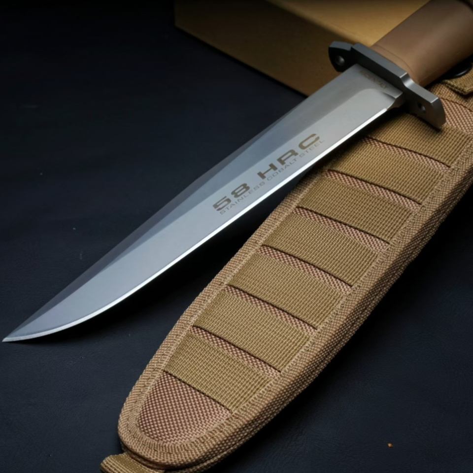 Blade close-up of Extrema Ratio A.M.F. BLACK bushcraft survival knife with desert handle