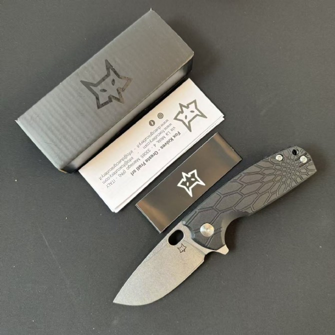 FOX FX-604 folding knife with black FRN handle and satin blade displayed open