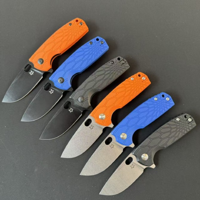 Front view of six FOX FX-604 folding knives with FRN handles shown deployed