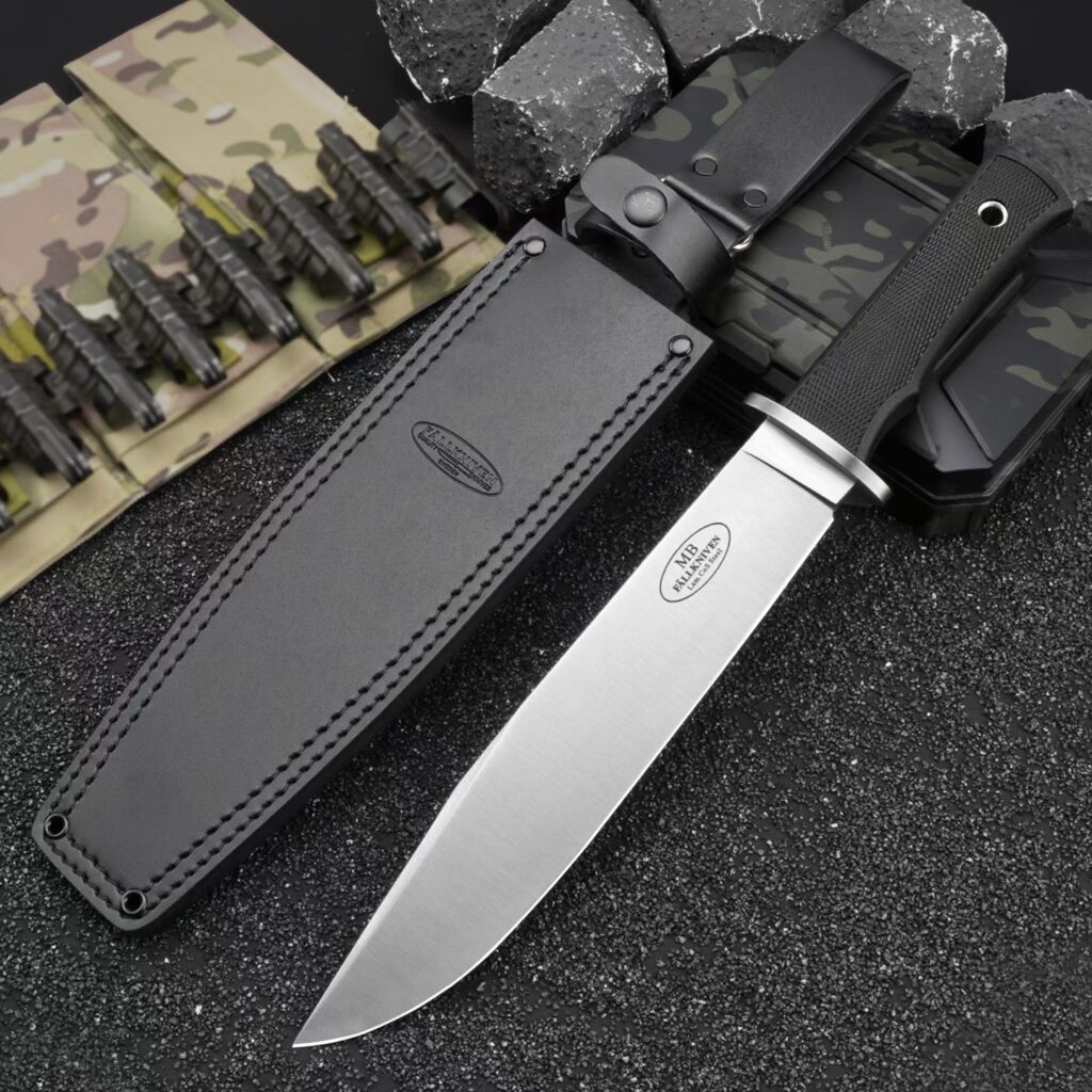 view of Fallkniven MB10 Modern Bowie fixed blade knife with sheath attached