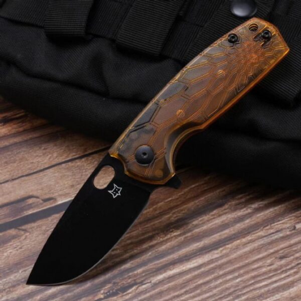 Folding knife with black coated blade displayed in open position