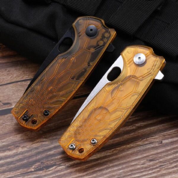 Front view of two folding knives shown folded side by side