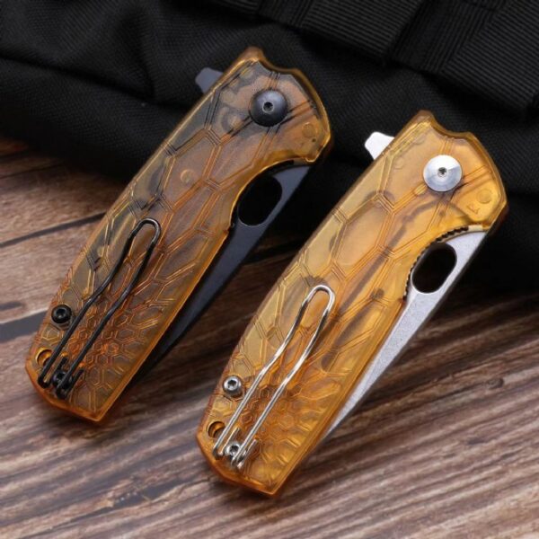 Rear view of two folding knives displayed in folded position