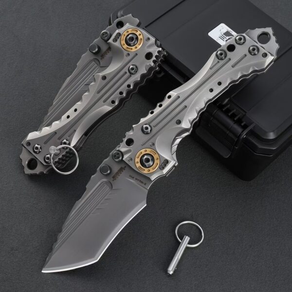 Front detail view of Miller Bros T1 Series heavy-duty tactical folding knife shown in deployed and folded positions