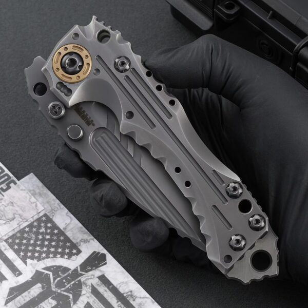 Handheld view of Miller Bros T1 Series heavy-duty folding knife in folded position