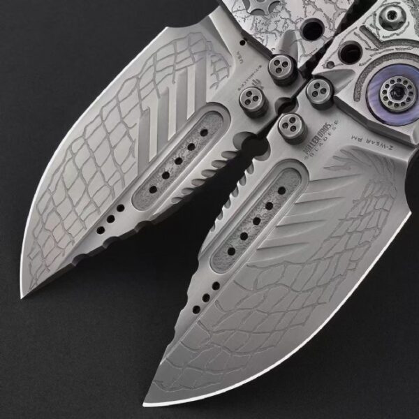 Blade close-up of Miller Bros T1 Series Jurassic folding knife highlighting edge and finish
