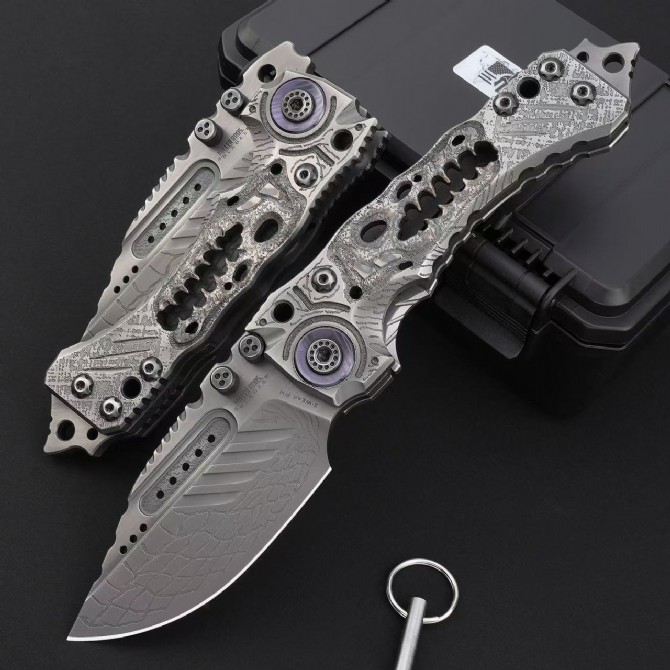 Front view of Miller Bros T1 Series Jurassic folding knife shown both deployed and folded