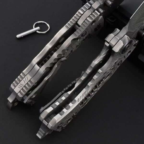 Close-up of Miller Bros T1 Series Jurassic folding knife handle showing scale texture