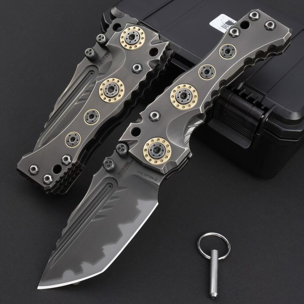 Front detail view of Miller Bros T1 Series Starfleet Edition tactical folding knife shown deployed and folded