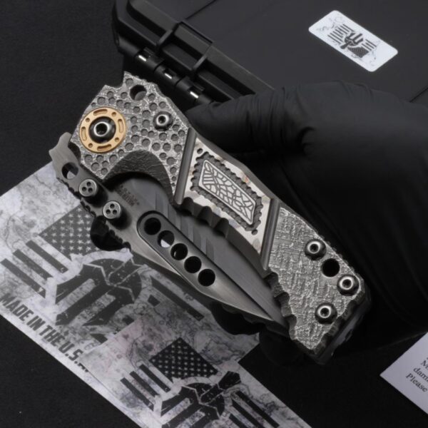 Miller Bros T1 Tactical Folder with labyrinth pattern handle shown in folded position