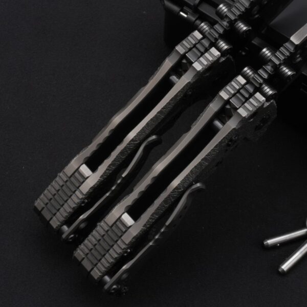 Detailed close-up of labyrinth pattern handle scales on Miller Bros T1 Tactical Folder