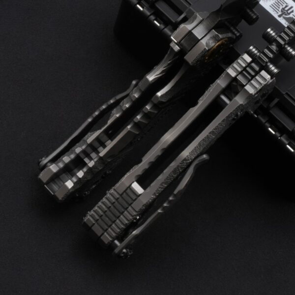 Close-up of handle hardware and labyrinth pattern texture on Miller Bros T1 Tactical Folder